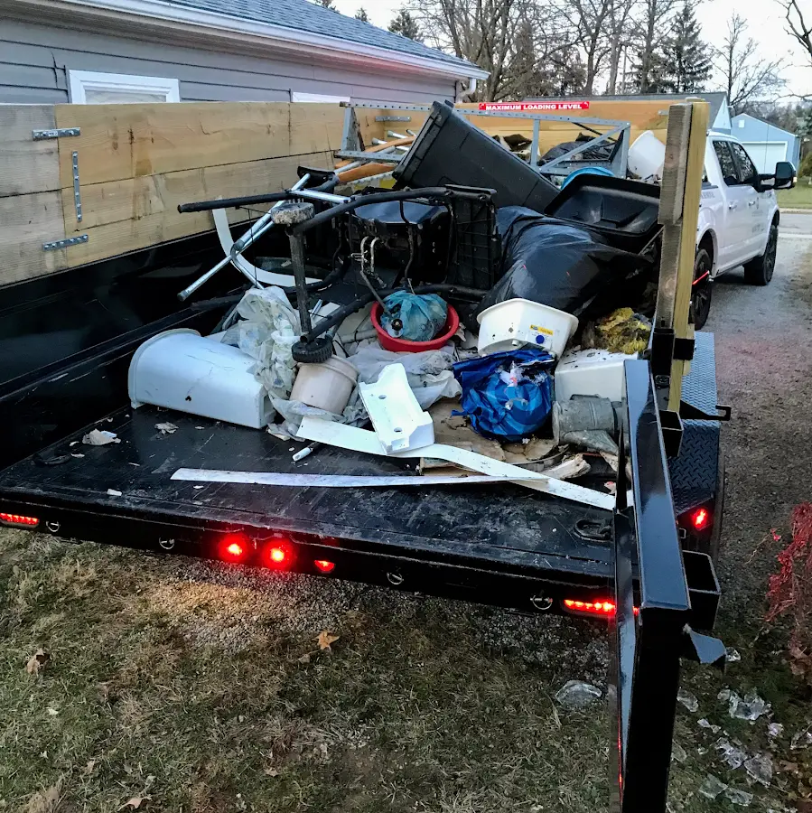 Roll-off dumpster delivered to a residential driveway in Buckingham
